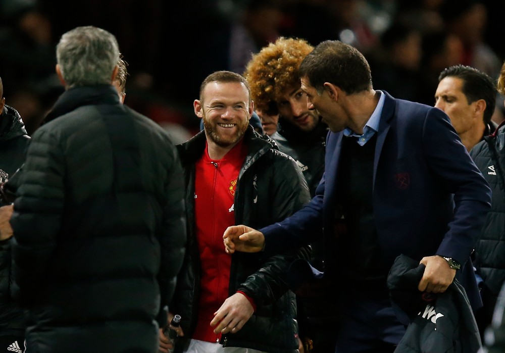 Na Old Traffordu s Rooneyem i Fellainijem. FOTO: REUTERS/Dave Thompson